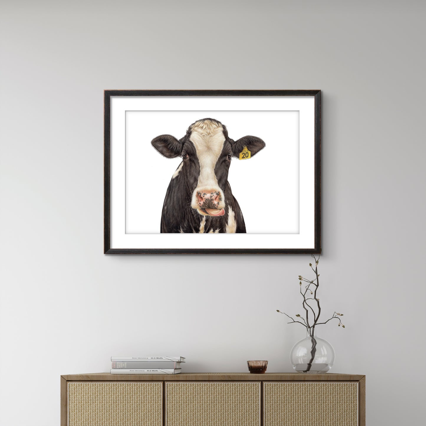 Lola Friesian cow limited edition art print displayed in a calm interior setting
