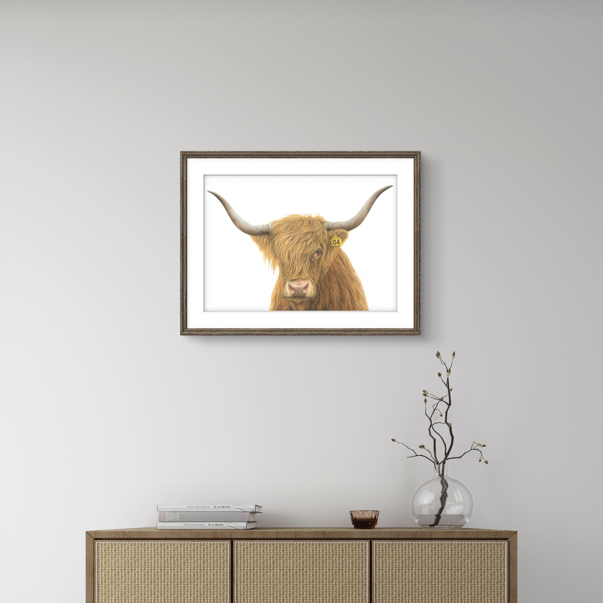 No. 04 “Una” Highland Cow limited edition art print displayed in an interior setting
