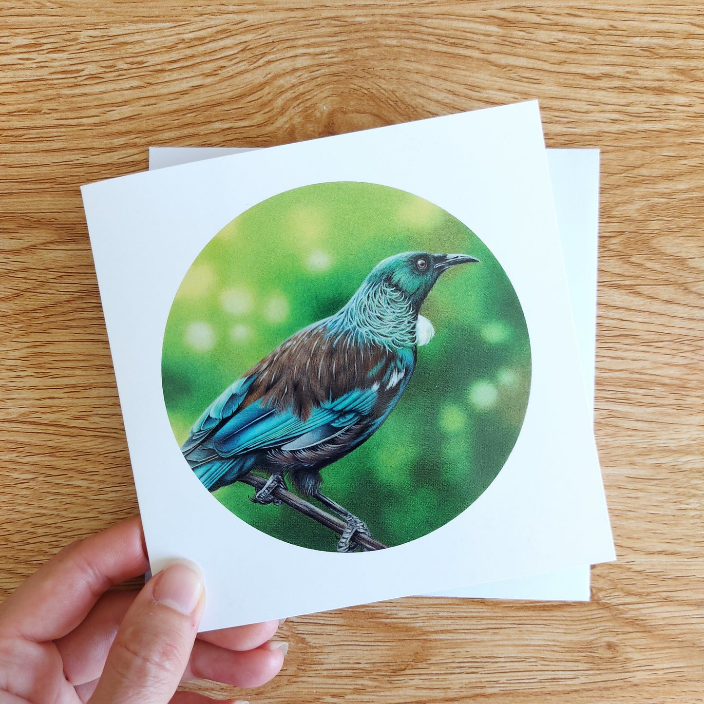 Greeting card featuring a coloured pencil illustration of a New Zealand tui